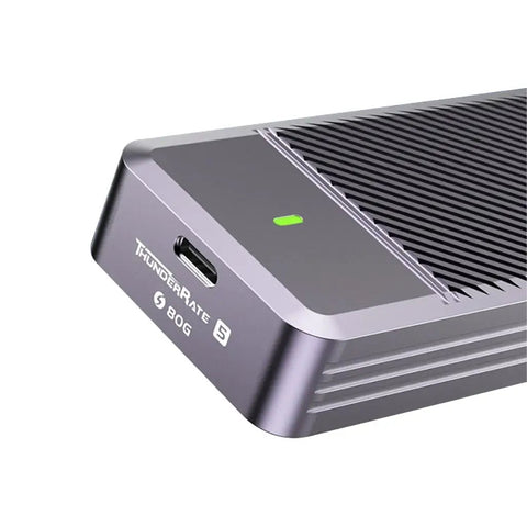 Close-up of Next Level M.2 NVMe 2280 Hard Drive Enclosure With Thunderbolt 5 hookup showing port and green indicator light.