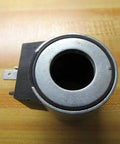 Top view of 24V DC Solenoid Coil Single Pack G745-4-A (G7454A) 18W for Hydraulic Valves, silver coil with black base.