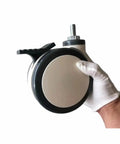 5 Inch Medical Caster Wheels With M12x25 Screw Bearing Brake for Hospital Cart and Hospital Bed, held in hand