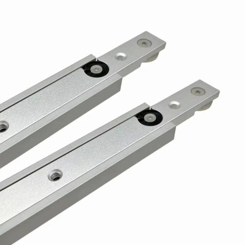 Close-up of T Track and Miter Track Jig Kit for woodworking table saws with aluminum alloy tracks and T bar sliders in silver.