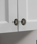 Two Pack Ceramic Cabinet Knobs 1.4 Inch Round Drawer Pulls With Mounting Screws Dope Modern Orange Cabinet Hardware For Kitchen Cabinets Closets And Dressers installed on a white cabinet