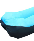 Close-up of blue inflatable lounger camping couch for adults and kids, air sofa chair, portable for beach, backyard, hiking, festivals, and travel.