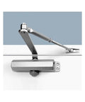 Automatic Door Closer With Adjustable Speed For 25-85 Kg Doors installed on a white door, showing metal arm and mechanism.
