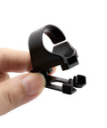 Close-up of hand holding a plastic snorkel keeper clip, part of 2 Pack Snorkel Keeper Clip Retainer For Snorkels And Masks Universal Plastic Clip With Quick Release Replacement Accessory For Scuba Gear And Snorkeling Set.