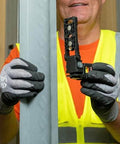Person holding Magnetic Pocket Laser Level With 360 Degree Wall Attachment, Red Laser Line Reaches 30 Feet, 3 Bubble Vials