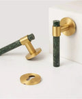 Solid Door Lock Set With Marble Finish Dope High End Nordic Style Hardware For Bedroom Living Room And Bathroom Premium Interior Handle Set With Sleek Modern Look showing gold and marble handles.
