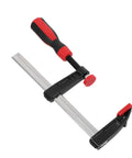 Heavy Duty 6 Inch F Clamp With Quick Adjustment And Antirust Finish For Welding Projects and Workshop Environments Featuring One Hand Operation and Durable Metal Bar Design Perfect For Woodworking and DIY Builds, close-up view.
