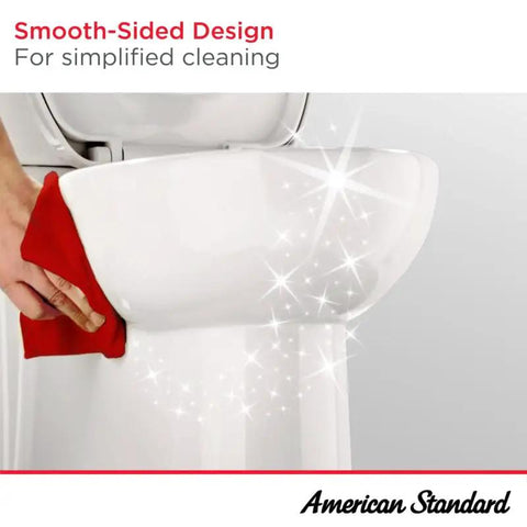 Heavy Duty Two Piece Elongated Toilet Featuring Reliable Powerwash Rim And Comfort Height Design For No Fuss Daily Refresh In Pristine White Porcelain being cleaned with a red cloth.