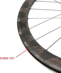 Close-up of 700C Carbon Fiber Wheelset With 50mm Fat Rim For Road Bikes showing brake rim and sturdy stainless spokes.