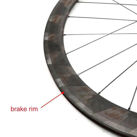 Close-up of 700C Carbon Fiber Wheelset With 50mm Fat Rim For Road Bikes showing brake rim and sturdy stainless spokes.