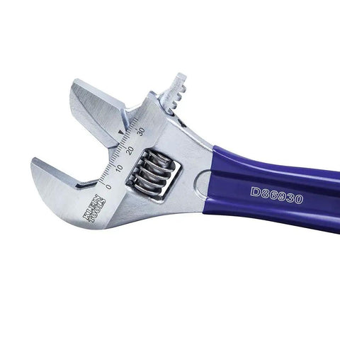 2-In-1 Reversible Adjustable And Pipe Wrench with extra wide 1-1/2 inch jaw, close-up on the metal head and scale, DIY home tool