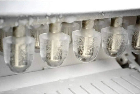 Countertop Ice Maker Machine With One Button Operation And Rapid Fast Ice Production Portable Kitchen Appliance For Home Use Easy Auto Or Manual Water Fill No Sweat Chill Essential ice production components showing clear ice shapes.