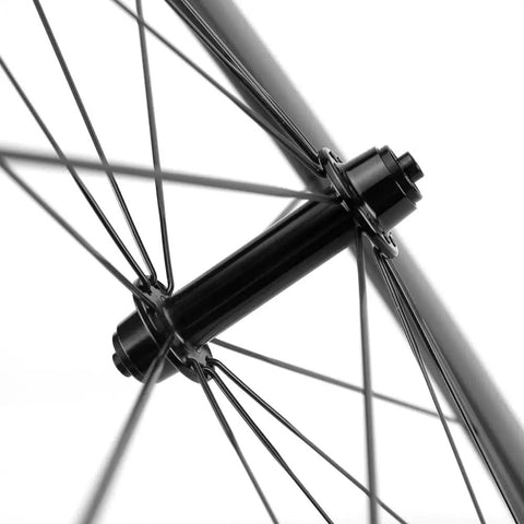 Close-up of hub and spokes on Carbon Road Wheelset 700c Matte Finish Clincher With 88mm Rim Brake For Fast Lightweight Rides