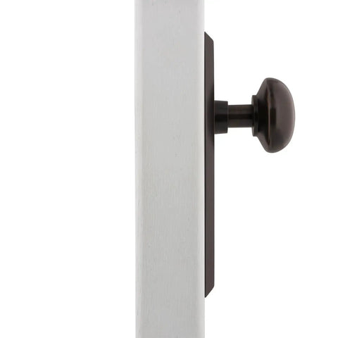 Side view of New York Style Door Knob With Plate Set For Interior Doors Smooth Round Knob Paired With Long Plate Classic Tailored Look