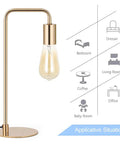 Industrial Edison Table Lamp Set of 2 in Gold Metal Finish with glowing bulb, ideal for desks, nightstands, coffee tables.