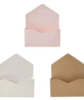 Three envelope-style boxes in pink, white, and brown. Five Pack Envelope Style Gift Boxes For Flowers And Crafting Parties.
