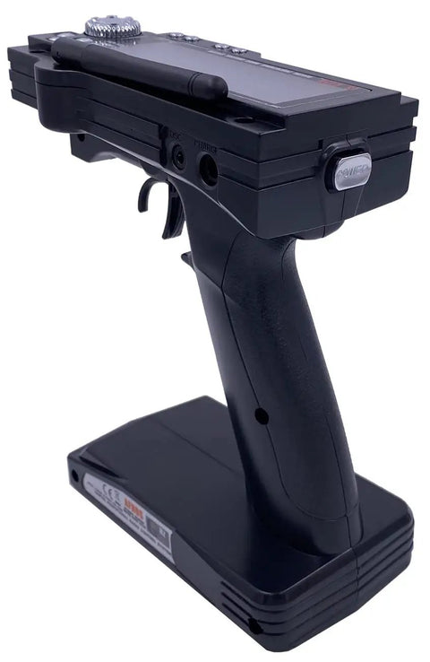 Side view of 3 Channel RC Transmitter And Receiver 2.4GHz AFHDS Sky Radio Control System with grip and LCD for RC cars and boats