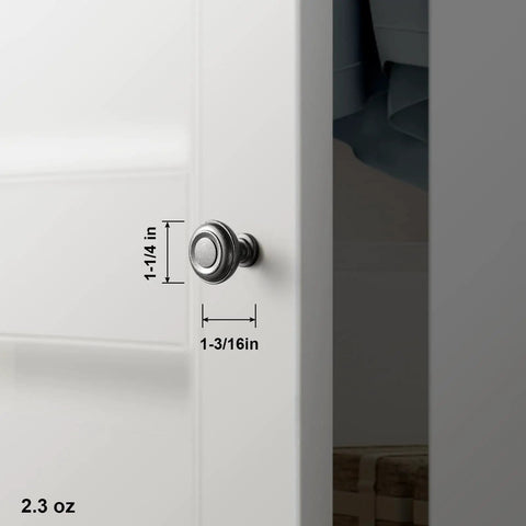 Straight Up Vintage Vibes With These Killer Weathered Nickel Cabinet Knobs Packed In A Six Pack For Instant Counter Makeovers close-up of weathered nickel cabinet knob with measurements on white door.