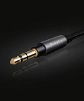 Close-up of detachable 3.5mm cable from Open Back Over Ear Wired Headphones With 50mm Neodymium Drivers Black Studio Monitor Quality