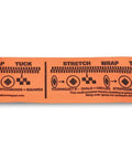 Orange Tourniquet For Emergency First Aid And Tactical Use With Stretch Wrap And Tuck Design For Massive Hemorrhage Control In Prehospital Care Made In The USA, unrolled with instructional markings visible.