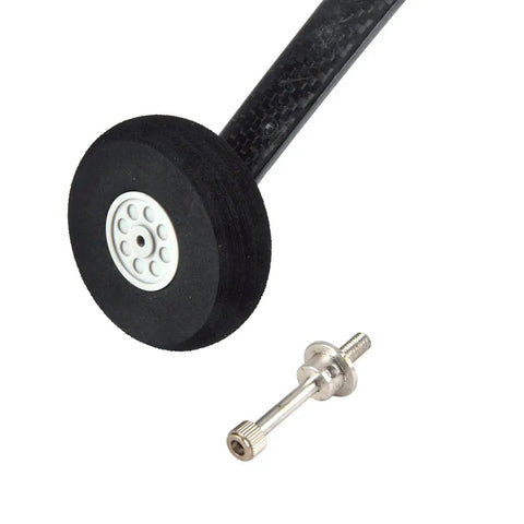 Close-up of Beefed Up Pro Grade Carbon Fiber Landing Gear Kit for 50E RC Jet Plane featuring foam wheel and axle hardware.