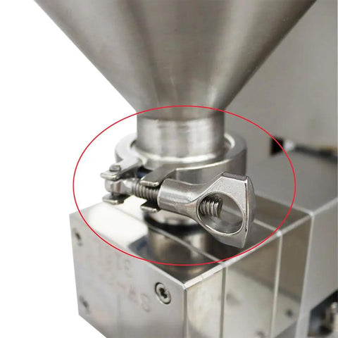Close-up of the stainless steel nozzle assembly on the Kickass Gear Pump Paste Filling Machine With 5 To 10000 Ml Range.