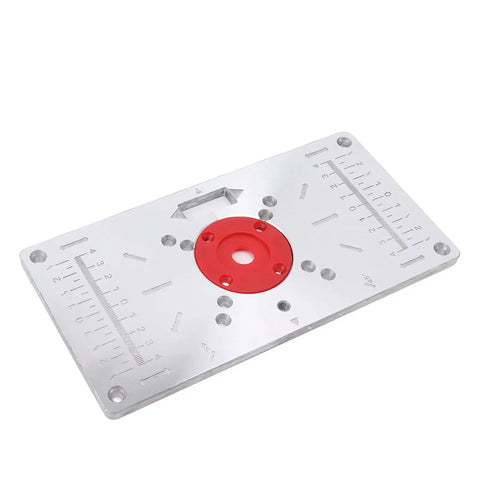 Hefty Aluminum Router Plate With Four Snap On Insert Rings For Sharp Wood Milling Trimming And Butter Smooth Engraving Jobs Shop Pro Gear that displays a precision aluminum insert with measurement markings.
