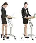 Hassle Free Pneumatic Sit Stand Laptop Desk Cart With Smooth Lever Adjustments, ergonomic mobile workstation in use.