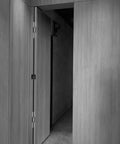 Concealed Tubular Door Closer Auto Soft Close For Fire Rated Doors Up To 50kg shown in hidden mount on wooden door frame