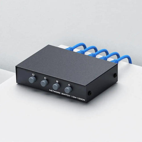 Bi Directional 4 Port Ethernet Switch With 1 Input 4 Outputs Or 4 Inputs 1 Output Gigabit 1000M Ethernet Network Hub on table