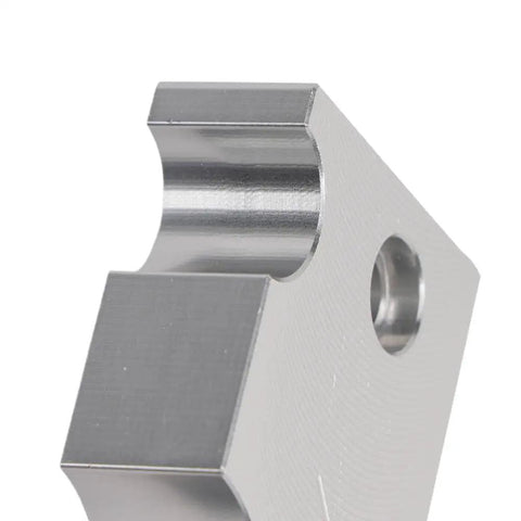 Close-up of Reservoir Body And Shaft Clamp 803 00 208 for Float X Shock Rebuild showing steel construction and precise fit