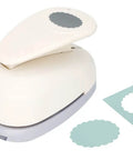 3 Inch Scalloped Ellipse Lever Action Craft Punch for paper crafting shown with punched scalloped shapes