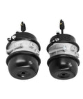 Two air brake chambers, 3 in bore, 30/30 long stroke, black ends with silver mounting flanges.