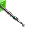 Close-up of a 3 Piece Cuticle Cleaning Carbide Nail Drill Bit with diamond rotary burr for electric nail file, green holder.