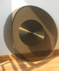 Big Round Glass Lazy Susan Turntable For Dining Table With Quiet Bearings resting on floor, 90 cm tabletop visible