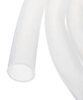 Close-up of crystal clear silicone tubing 3.3 ft long, 1.25 in ID by 1.5 in OD for heavy duty siphon pump tubing, ideal for various uses.
