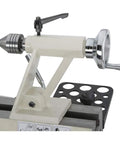 Dead Reliable Bench Top Wood Lathe With 12 Inch Swing And 15 Inch Turning Space Featuring A Zippy Three Quarter Horsepower Motor showing tailstock with precision center.