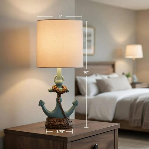 Anchor Accent Lamp With Cozy Coastal Vibe In Antique Iced Blue Resin Anchor Base on bedroom nightstand, 16 in tall, 8 in diameter