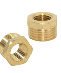 Two brass reducer hex bushings, 1/4 in NPT male to 1/2 in NPT female, threaded pipe fittings