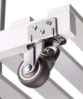 Top Shelf Swivel Casters With Brakes And Slick Nylon Wheels For Flower Stands And Furniture easy setup, mounted on a wooden shelf.