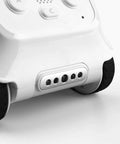Codey Rocky Interactive Coding Robot For Kids Aged 6 To 12, Beginner Friendly Remote Control Toy That Sparks Problem Solving, Logic, And Coding Fun Totally Dope Right Out Of The Box. Close-up of white panda coding robot base with black wheels