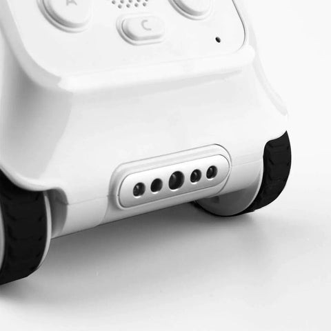 Codey Rocky Interactive Coding Robot For Kids Aged 6 To 12, Beginner Friendly Remote Control Toy That Sparks Problem Solving, Logic, And Coding Fun Totally Dope Right Out Of The Box. Close-up of white panda coding robot base with black wheels