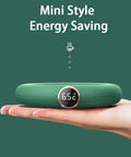 Keep Your Daily Brew Piping Hot On This Stylish Electric Coffee Mug Warmer with temperature display on palm.