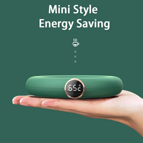 Keep Your Daily Brew Piping Hot On This Stylish Electric Coffee Mug Warmer with temperature display on palm.