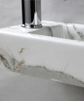 Close-up of compact white ceramic wall mounted sink for small bathrooms, rectangular vitreous china wash basin with glossy finish.