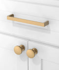 Champagne Bronze Cabinet Pulls 5 Inch 128mm Solid Zinc Alloy Handles for Kitchen Cabinets and Drawers installed on white cabinet