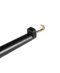 Close-up of black 42mm solderable test hook clip with copper gold-plated tip for multimeters and PCB testers
