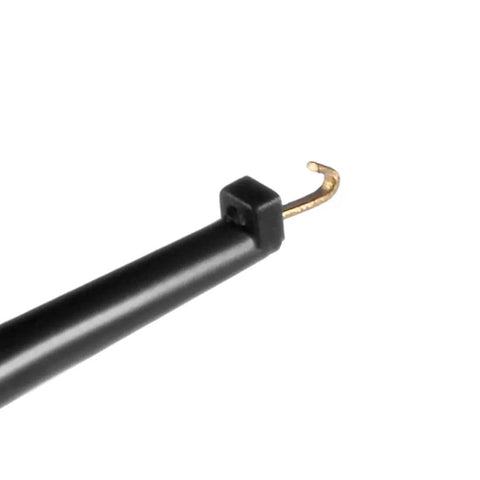 Close-up of black 42mm solderable test hook clip with copper gold-plated tip for multimeters and PCB testers