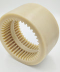 One Piece Curved Teeth Nylon Sleeve Gear Coupling Sleeve Replacement For Precision Machinery With M-65 Compatibility, 132mm Outer Diameter, 42-Tooth Count, High Torque Drive Coupling Sleeve, Durable Nylon Construction on white background
