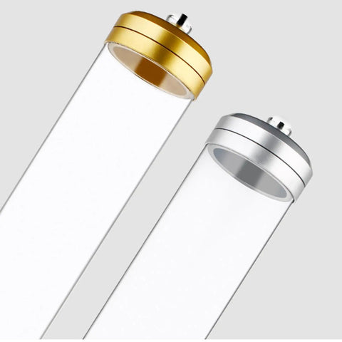 Straight Up Premium Coffee Bean Storage Canister Keeping Beans Extra Crisp In A Top Shelf Gold Tube Jar For Whole Grains And Snacks Kitchen Pantry Display Jar with gold and silver lids.
